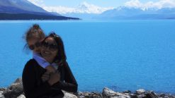 Lara and Mom at Lake Pukaki. Lara is the youngest travel blogger in the wotld.