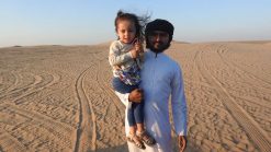 Lara and our safari driver. The world's youngest travel blogger.