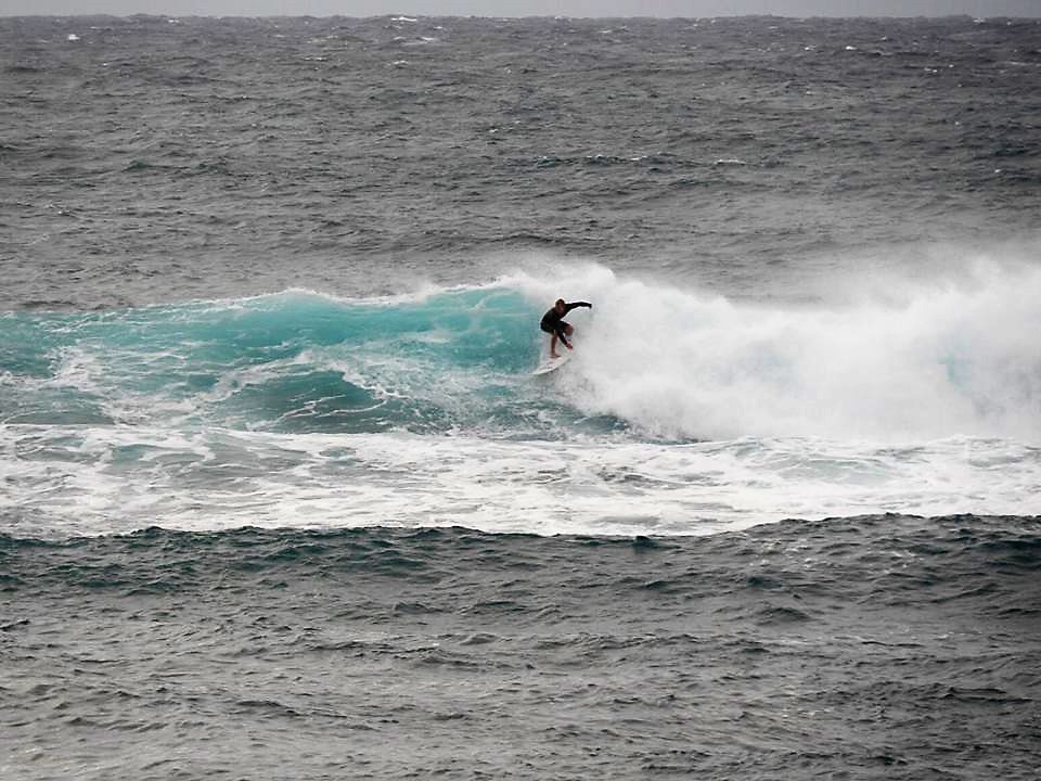 Surfing at Banzai Pipeline, Oahu