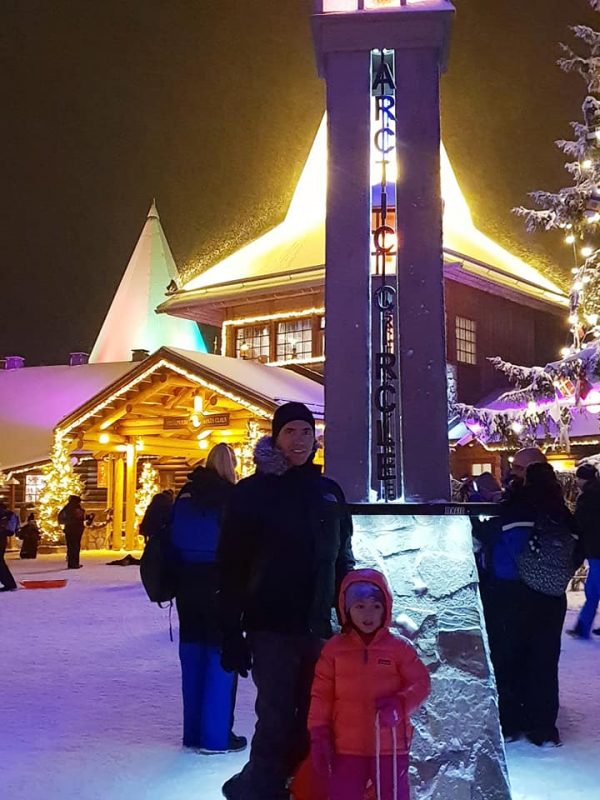 Lara and daddy at the Arctic Circle in Rovaniemi, Lapland, Finland